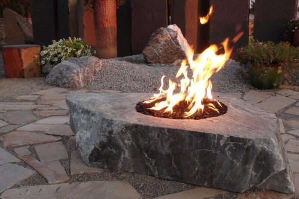 propane fire pit in a rock